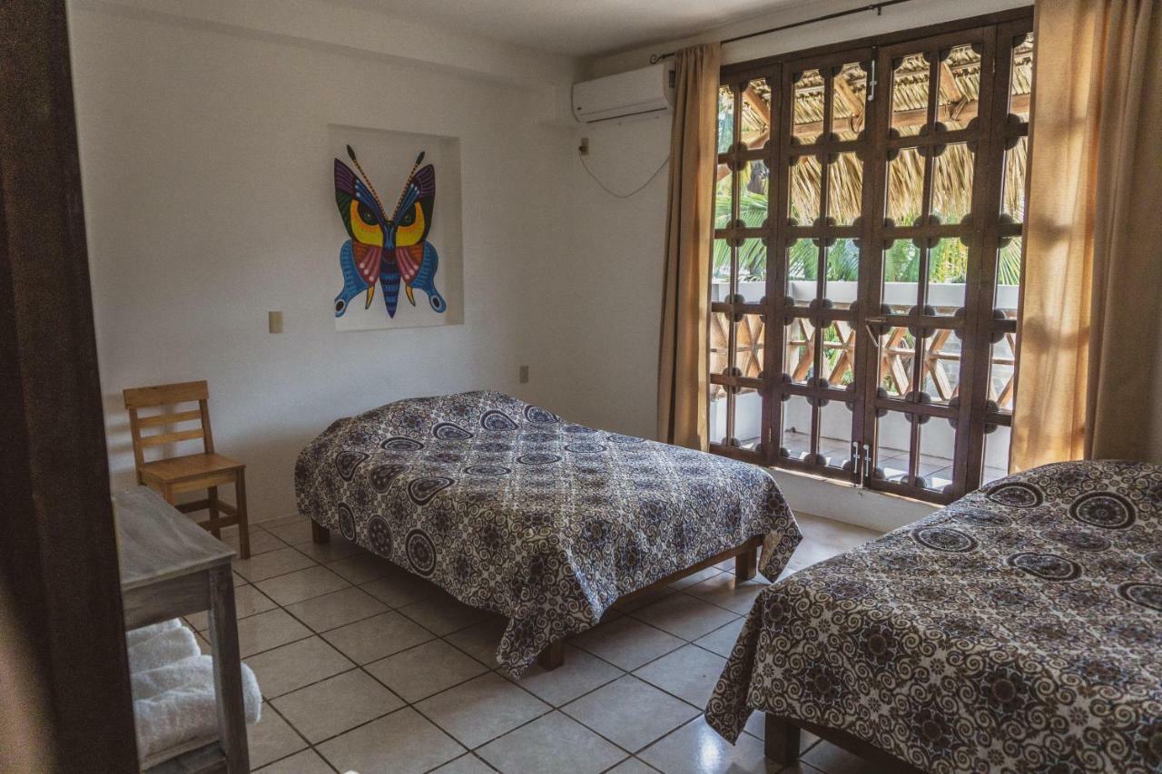 Отель Nomad Beach House Пуэрто-Эскондидо Экстерьер фото