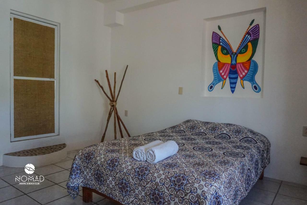 Отель Nomad Beach House Пуэрто-Эскондидо Экстерьер фото